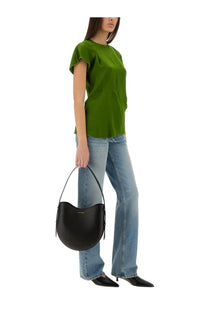 Black leather crescent-shaped handbag with single shoulder strap and subtle gold-tone hardware by victoria beckham
