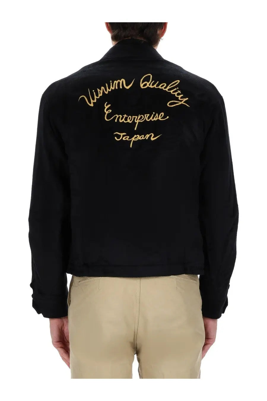Back view of visvim men’s norad blouson black bomber jacket with gold embroidered vitamin quality enterprise japan text