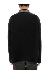 Vivienne westwood men’s black long sleeved polo shirt with colorful striped collar and a fitted jacket style