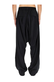 Vivienne Westwood men’s black harem pants with elastic waistband and two front pockets in loose fit style