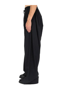 Vivienne Westwood men’s black wide-leg pants with drawstring waist and relaxed flowing fabric for comfort