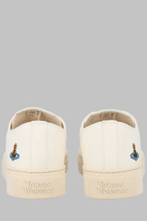 Back side of cream-colored vivienne westwood men sneaker low top primsoll slip-on with embroidered logo heel details