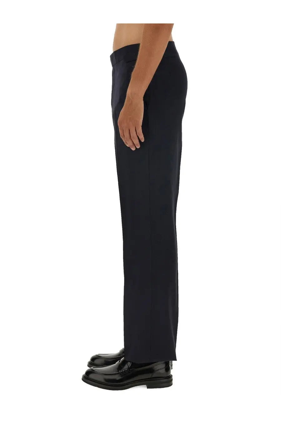 Black wool tailored trousers by Vivienne Westwood men’s with sleek straight-leg cut and subtle fabric creasing
