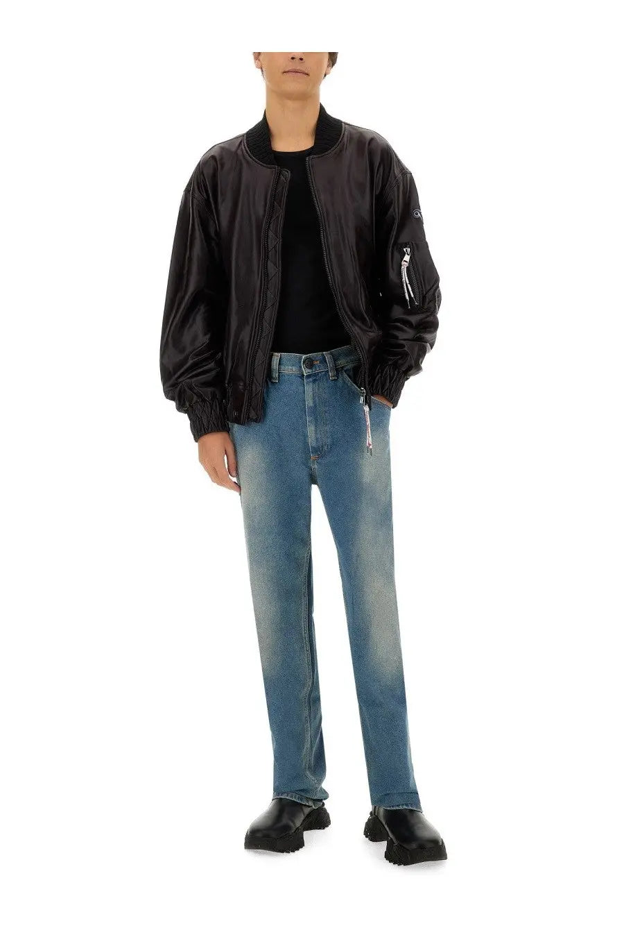 Black bomber jacket with glossy finish and ribbed cuffs shown with vivienne westwood unisex jeans baggy blue