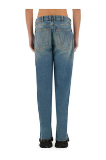 Vivienne westwood unisex baggy blue denim jeans back side with faded wash and classic wrangler logo pockets