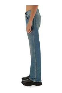 Vivienne Westwood unisex baggy blue denim jeans with faded wash and classic five-pocket design