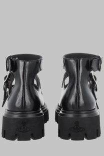 Vivienne westwood women’s anfibio bacchus con fibbie black glossy leather platform boots with chunky soles and ankle straps