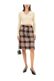 Vivienne westwood women’s bea shirt white paired with a beige and maroon plaid midi skirt with a drawstring waistband