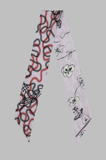 White silk scarf by Vivienne Westwood featuring bold red and black abstract swirls with delicate floral illustrations
