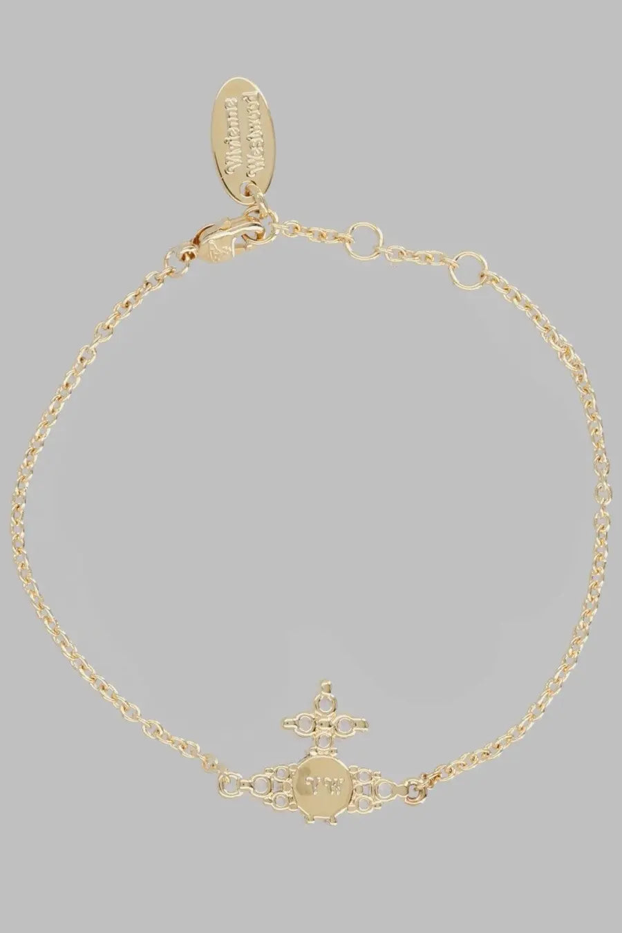 Gold-toned vivienne westwood womens bracciale feodora bracelet with central circular charm engraved initials and ornate cross design