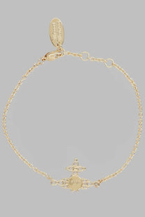 Gold-toned vivienne westwood womens bracciale feodora bracelet with central circular charm engraved initials and ornate cross design