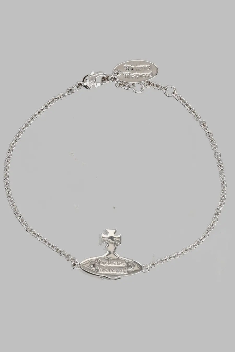 Silver vivienne westwood women’s bracelet with chain and oval pendant featuring cross orb in basso rilievo silver