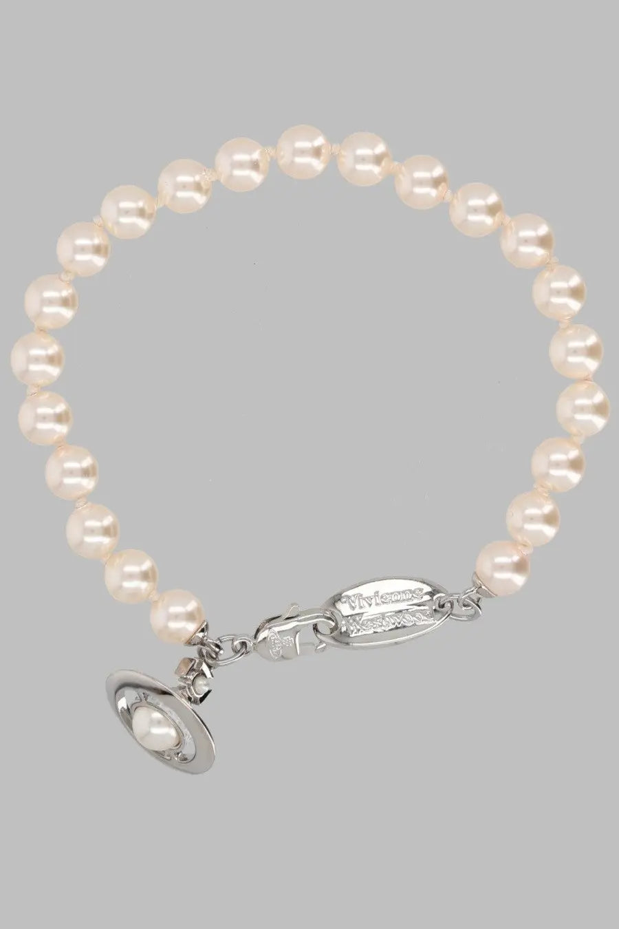 Vivienne westwood women’s pearl bracelet with silver clasp and charm featuring creamy white pearls
