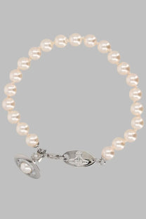 Vivienne Westwood women’s gold pearl bracelet with silver clasp featuring the iconic orb logo and matching charm