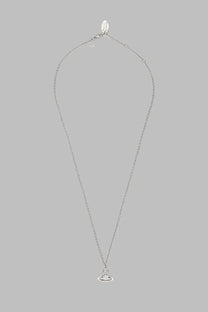 Silver chain necklace by vivienne westwood featuring a small circular pendant with a central gemstone