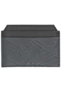 Vivienne Westwood women’s black leather card holder with embossed floral pattern and visible edge stitching