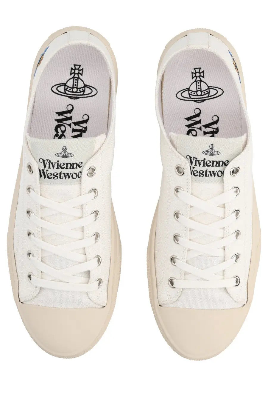 Vivienne Westwood women’s low top plimsoll sneaker in white canvas with beige soles and silver eyelets featuring logo insole