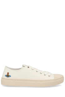 Vivienne Westwood women’s cream canvas low top plimsoll sneaker with embroidered lighthouse logo on side in white