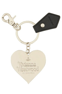 Silver heart-shaped keychain with vivienne westwood engraved logo and black leather tag in mirror heart design