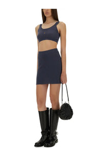 Black circular ruched handbag with silver hardware featured with vivienne westwood women’s top bea bra purple