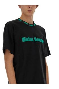 Wales Bonner men’s black cotton short-sleeved t-shirt with teal embroidered logo and matching patterned collar