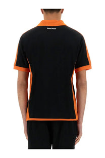 Wales Bonner men’s black and orange short-sleeved jersey polo shirt with white embroidered logo on the collar