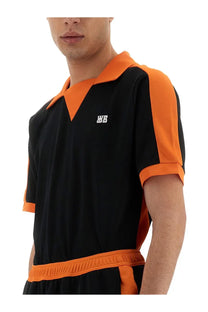 Wales Bonner men’s black and orange short-sleeved jersey polo with contrasting collar cuffs and waistband