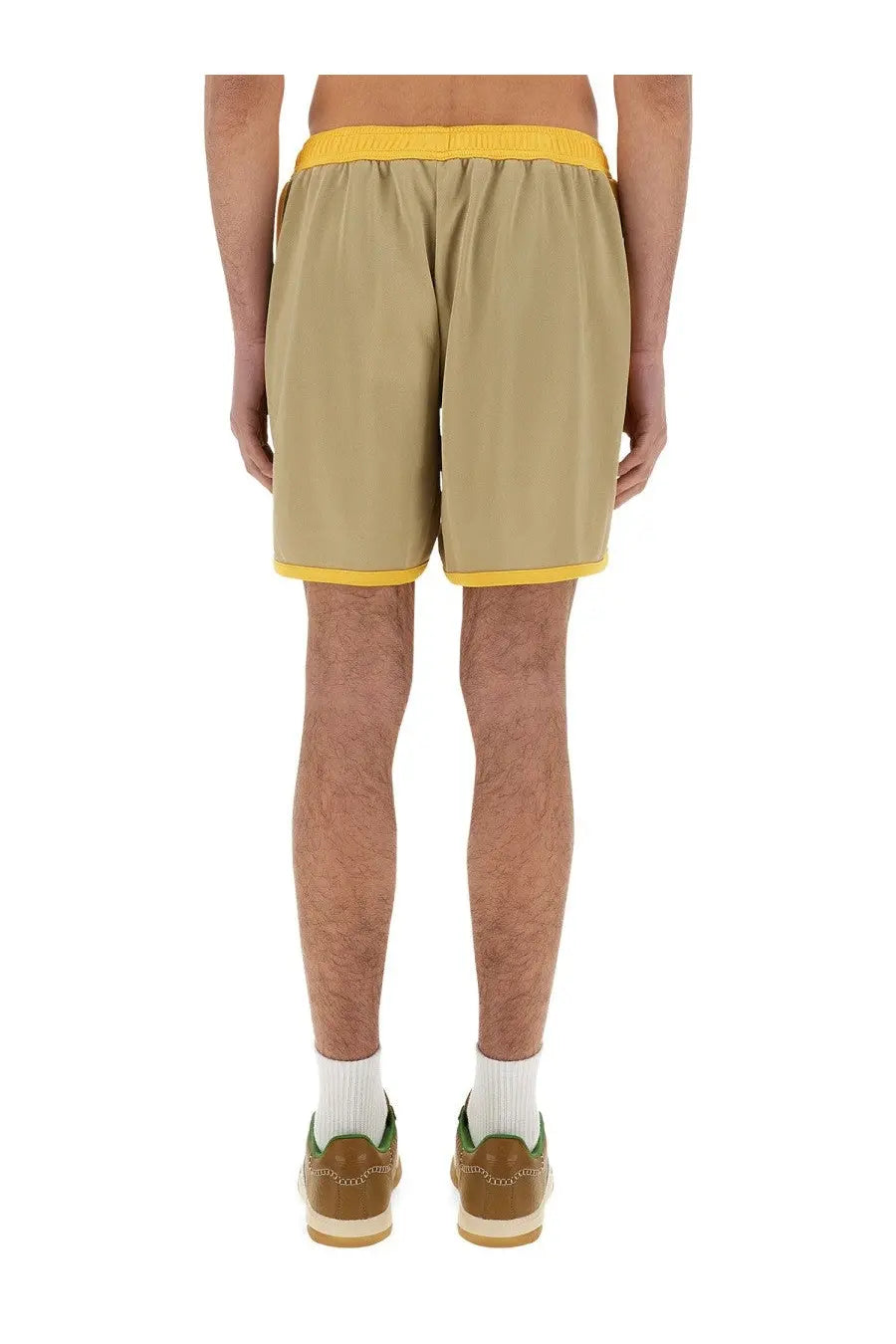 Wales Bonner men’s jersey shorts in beige with bright yellow elastic waistband and matching hem trim