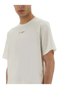 Wales Bonner men’s original white minimalist off-white cotton t-shirt with small gold je taime embroidery on left chest