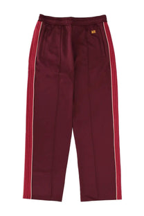 Wales bonner unisex jogger pants in maroon with red and white striped side panels for casual wear