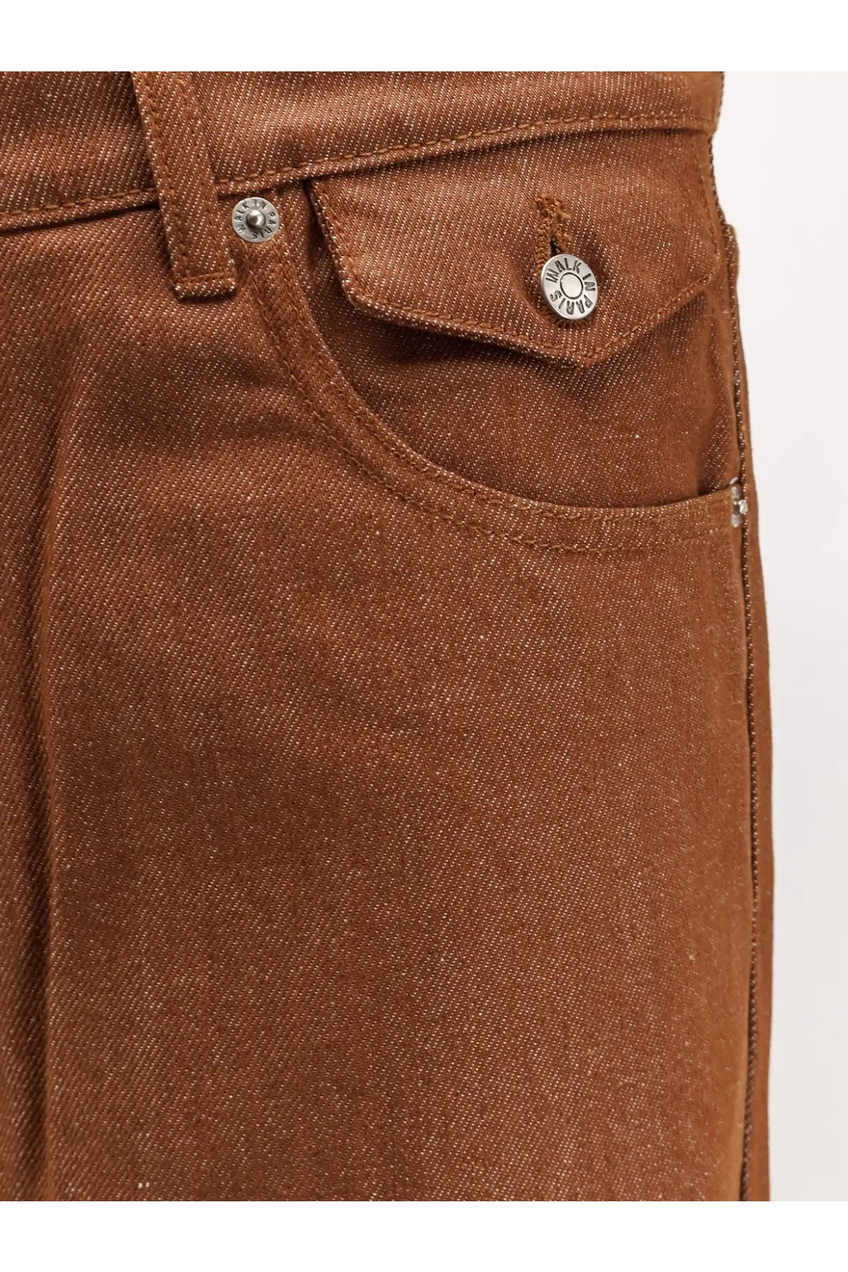 Walk in paris men’s baggy brown denim trousers featuring wilco silver toned buttons on brown denim material