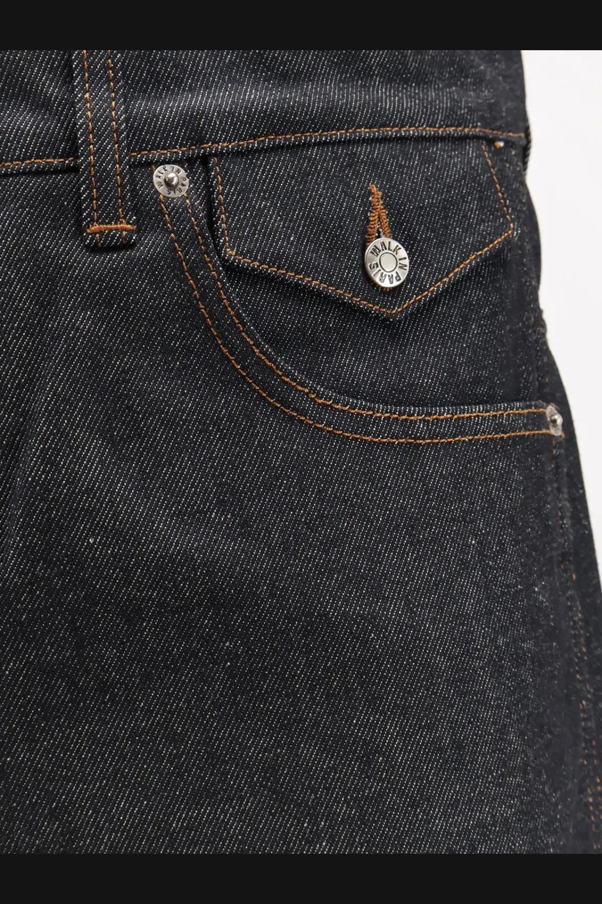 Walk in Paris men’s baggy raw denim shorts in dark-wash blue with silver-toned Salvatore buttons on front pocket