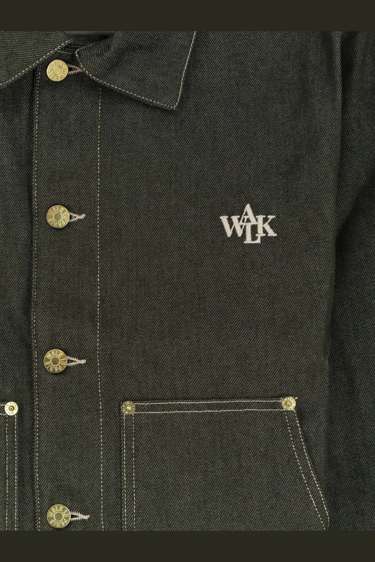 Dark green denim jacket with gold-tone buttons and white embroidered walk logo on chest from Walk In Paris men’s collection