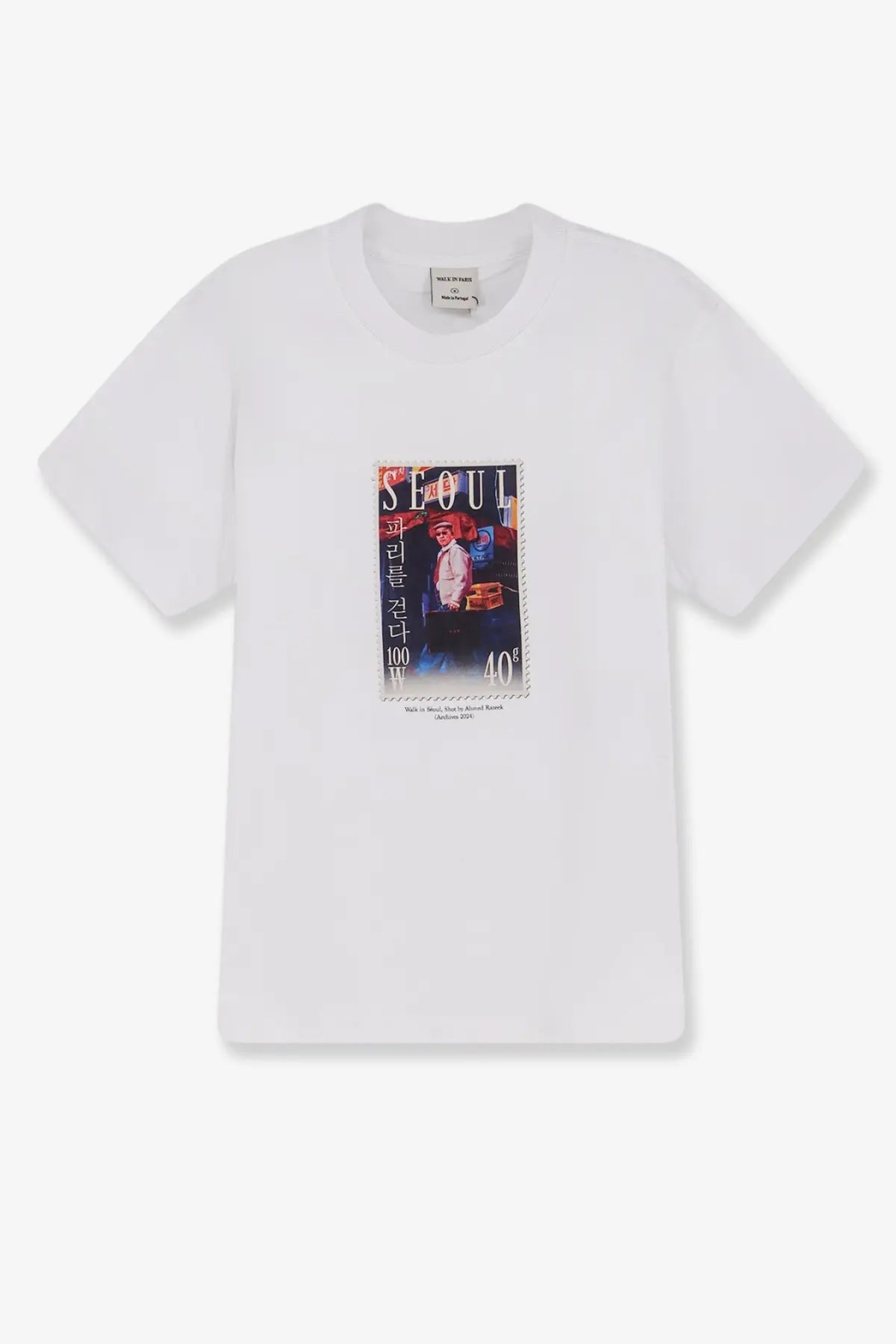Walk in Paris men’s white cotton t-shirt featuring a vintage-style Seoul postage stamp graphic with bold lettering