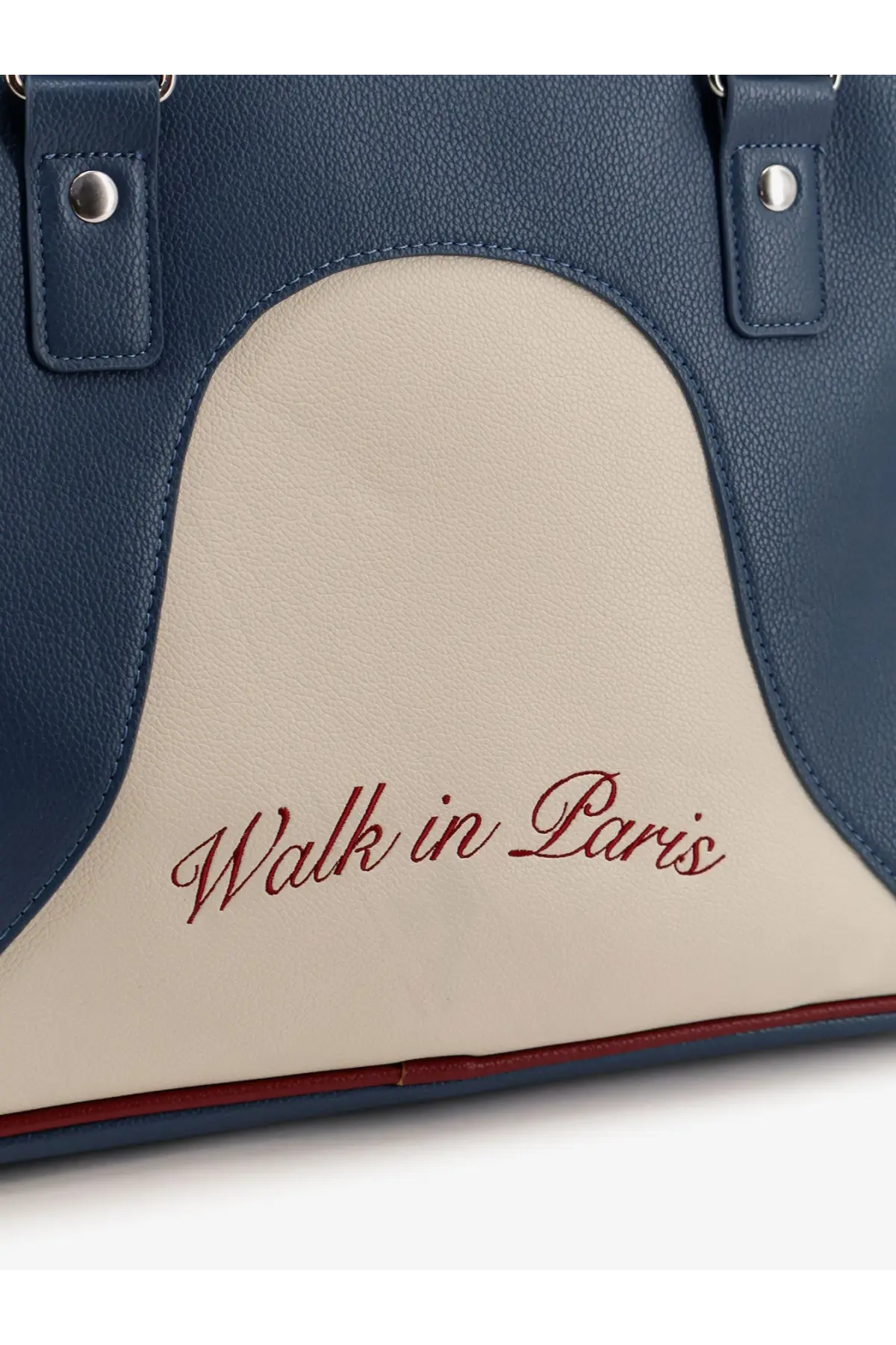 Walk in paris men’s leather crossbody bag in navy blue and cream with walk in paris embroidered in red script
