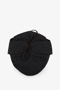 Black denim face mask with tied cord closure shown with walk in paris men’s sherlock raw denim hat blue