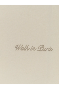 A cream-colored cotton shirt with walk in paris embroidered in silver thread on beige Walk In Paris men’s timeless shirt