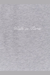 Gray heathered cotton t-shirt with walk in Paris embroidered in white cursive in the Walk In Paris men’s sweatshirt line