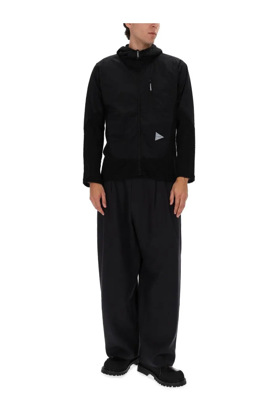 And wander men’s alpha direct jacket black with hood and subtle silver triangular logo on the chest