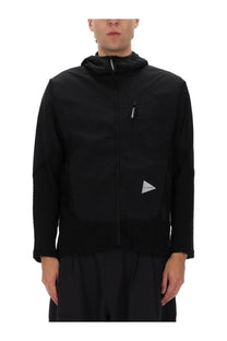 And wander men’s alpha direct black hooded jacket with fleece lining and reflective triangular logo patch on chest