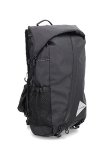 And wander men’s backpack ecopack 18l black waterproof with mesh side pocket and white triangular logo