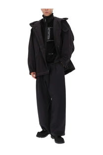 And wander men’s fishtail octa jacket black oversized utility jacket with structured shoulders and hood