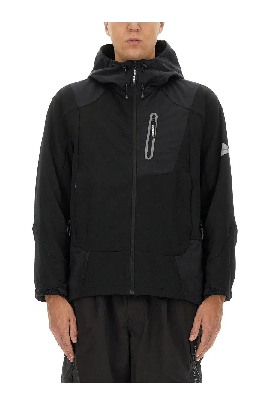 And wander men’s hooded jacket black with subtle gray zipper accents and sleek modern design in lightweight material
