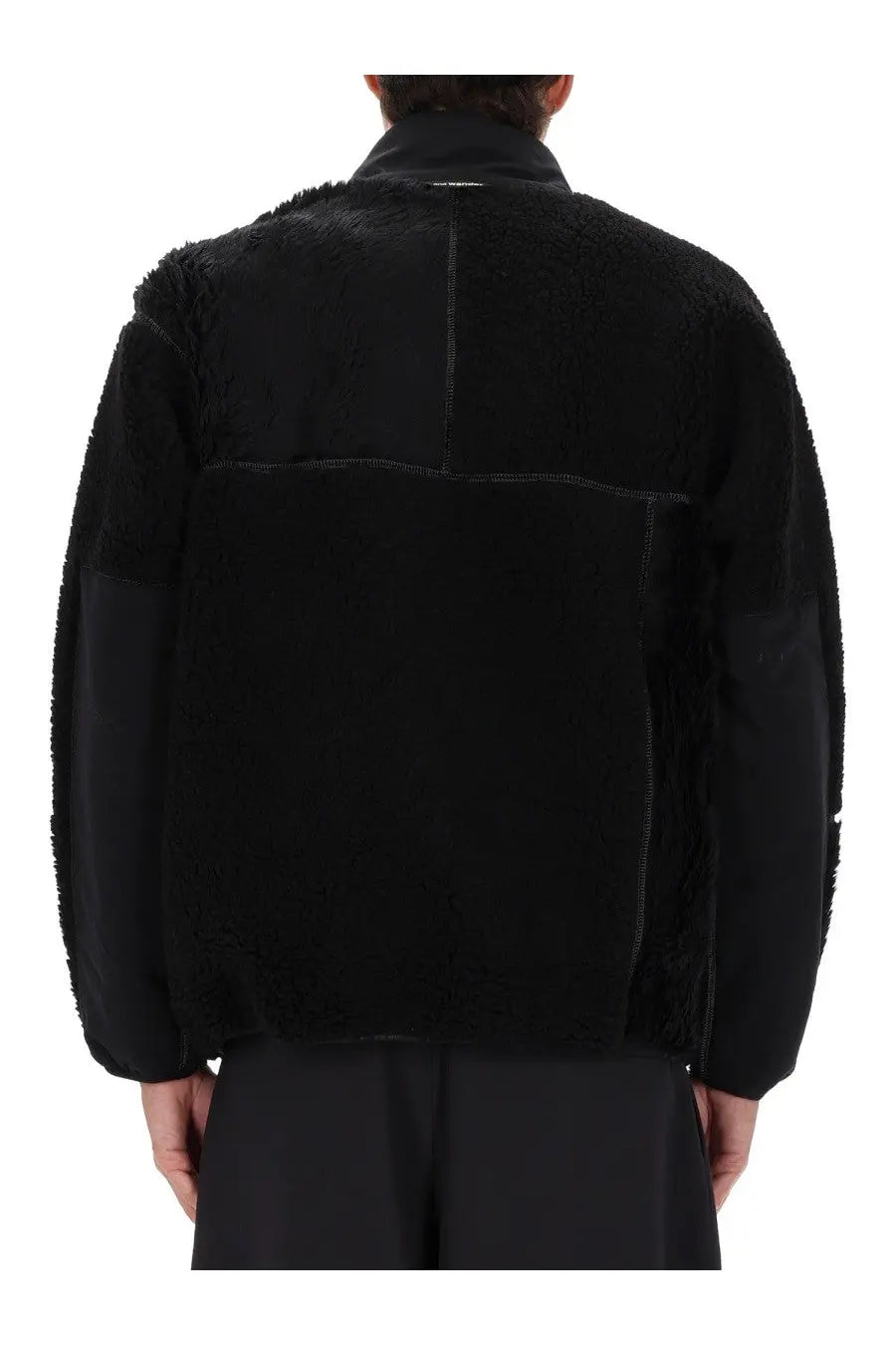And wander men’s mix boa jacket black with plush shearling exterior and contrasting smooth sleeve panels