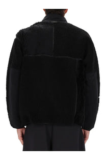 And wander men’s mix boa jacket black with plush shearling exterior and contrasting smooth sleeve panels