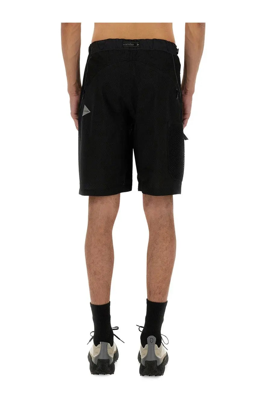 And wander men’s nylon shorts black with sleek design gray triangular accents on side pockets and branded waistband
