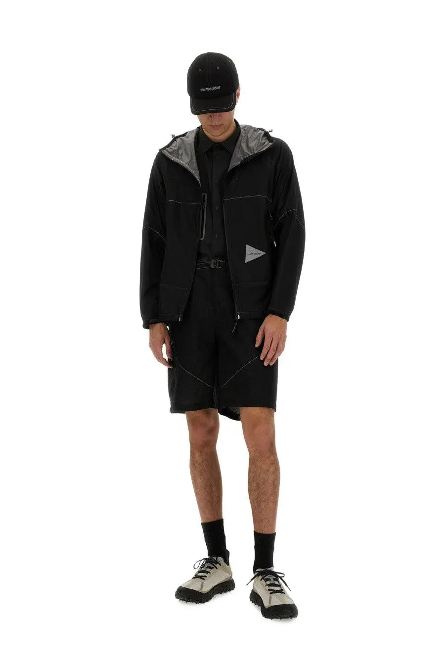 And wander men’s ul jacket black hooded with reflective silver trim and triangular logo patch on chest