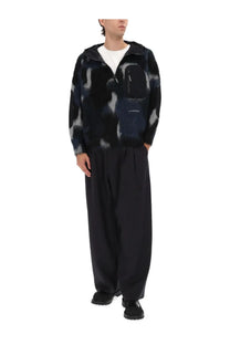 And wander men’s black and gray abstract patterned fleece hoodie with front zipper chest pocket and hood