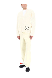Cream-colored knit cardigan with black off-white arrow logo on the left chest in beige wool blend