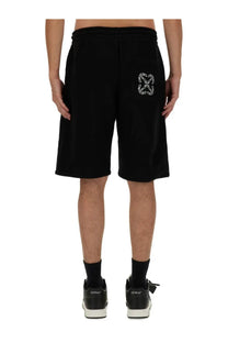 Back side of off-white men’s black sweat shorts featuring white embroidered logo on the back pocket